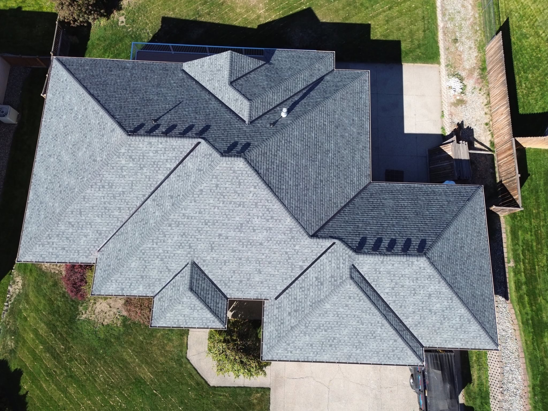Overhead view of the completed gray architectural shingle reroof